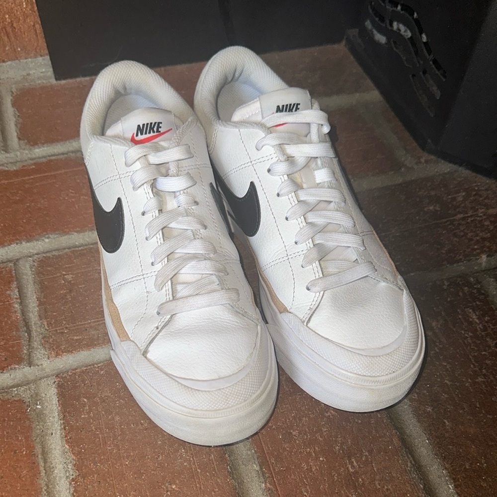 Nike White Sneakers with Black Swoosh